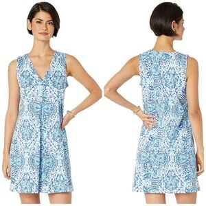 Lilly Pulitzer Amina shift dress in “Call my Shell Phone” pattern.